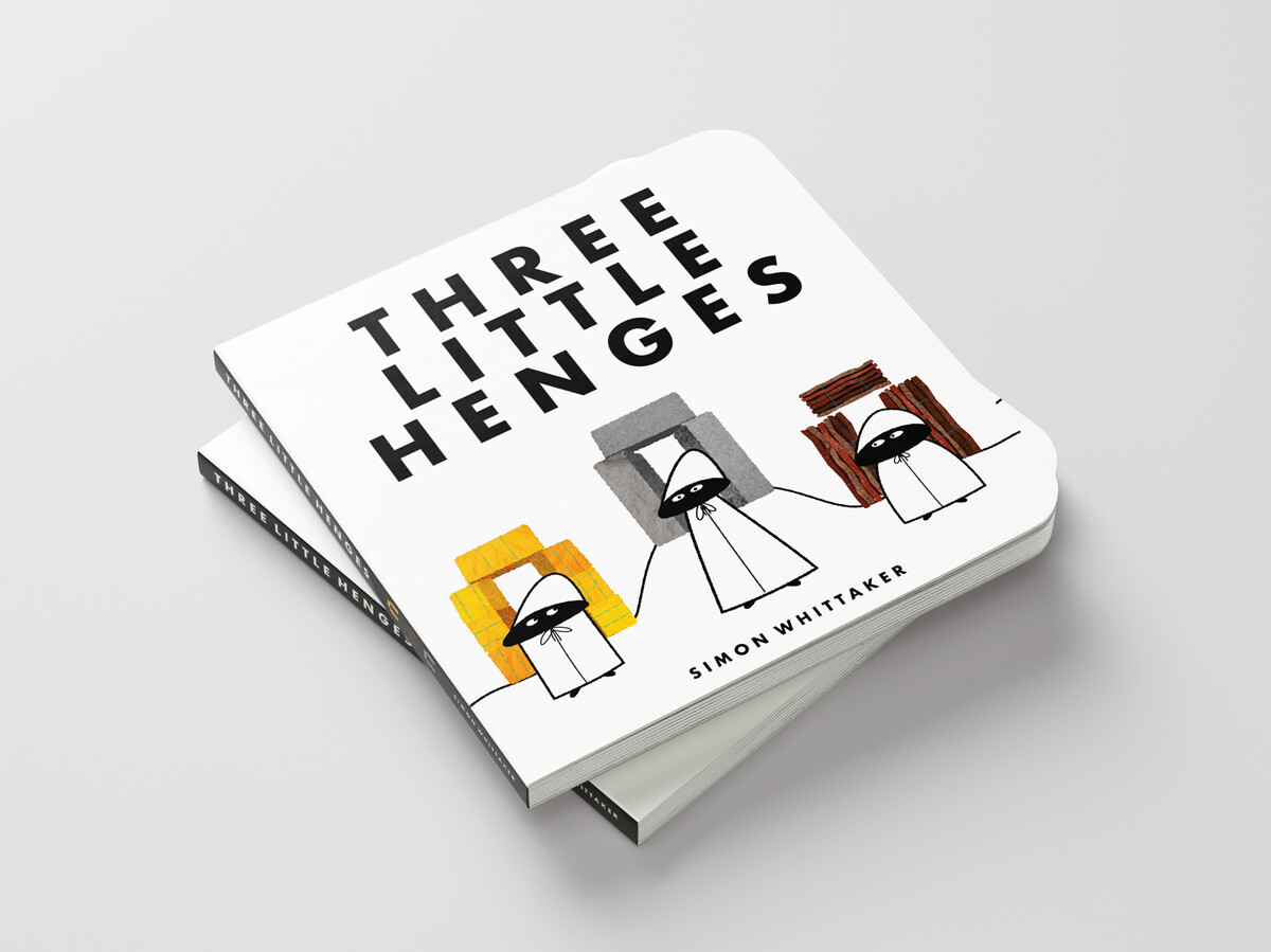 Mockup of picture book cover concept showing three whimsical black and white hooded figures standing in front of Stonehenge replicas made out of different materials.